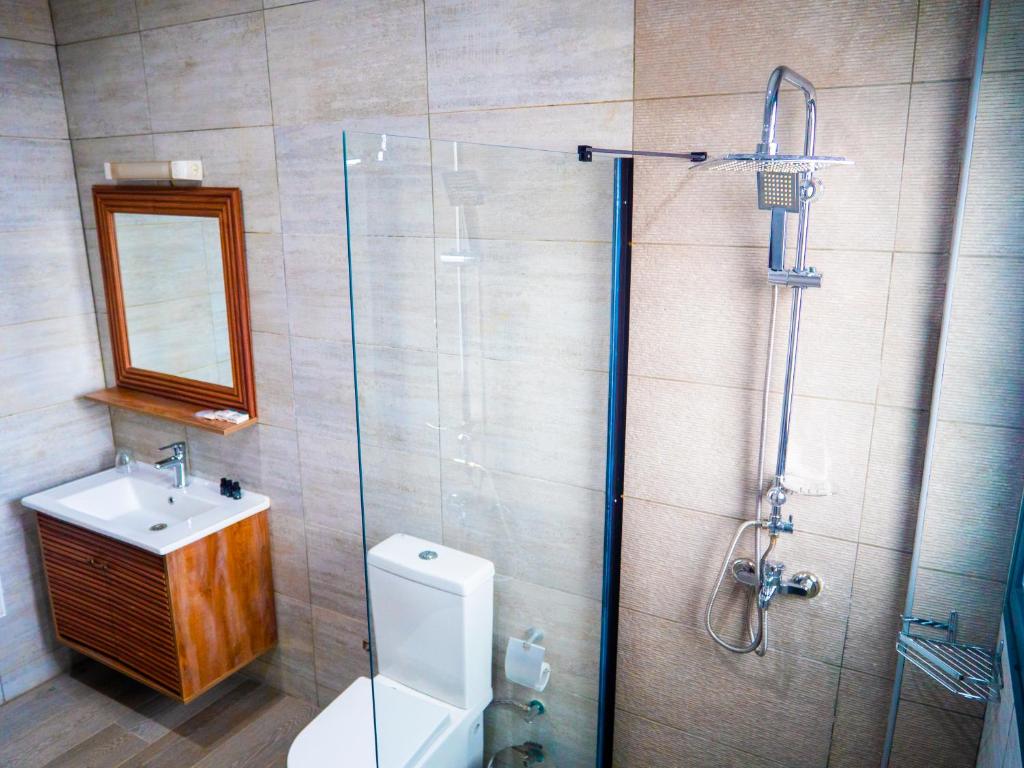Koupelna v ubytování Hôtel KEMAKA