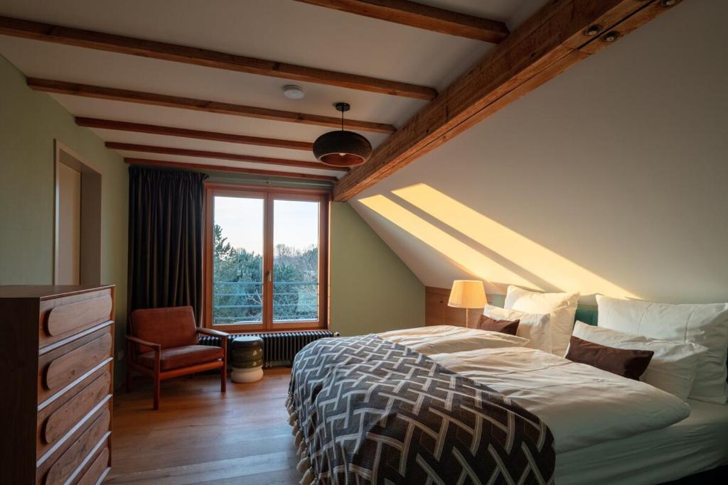 Postel nebo postele na pokoji v ubytování Design farmhouse in the countryside