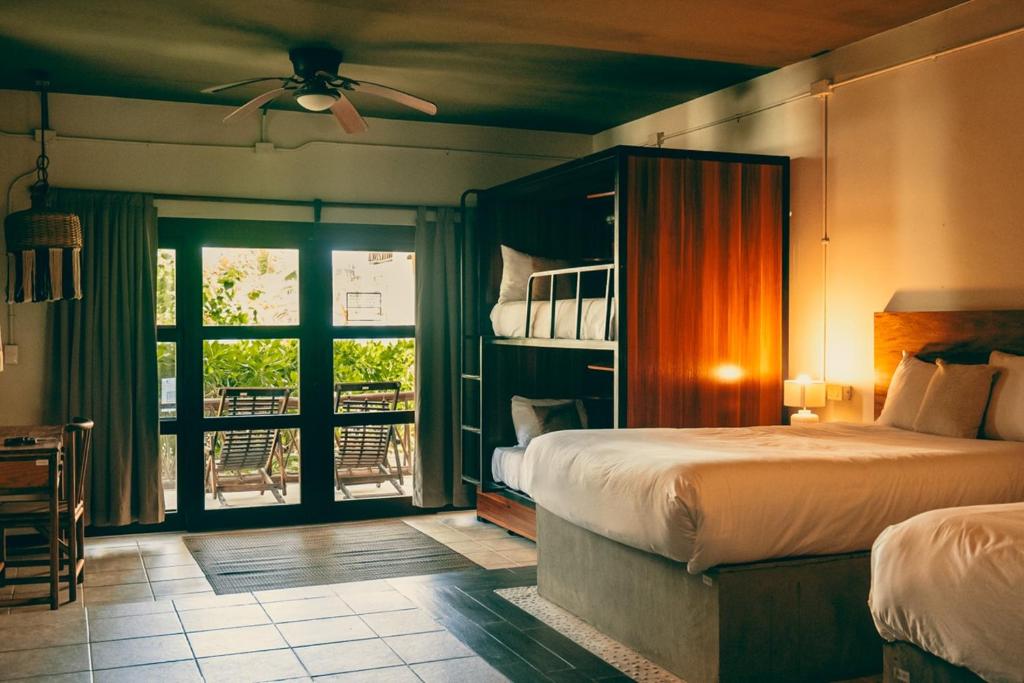 Postel nebo postele na pokoji v ubytování Mia Tulum Beachfront Resort - Ocean View Suites and Beach Club