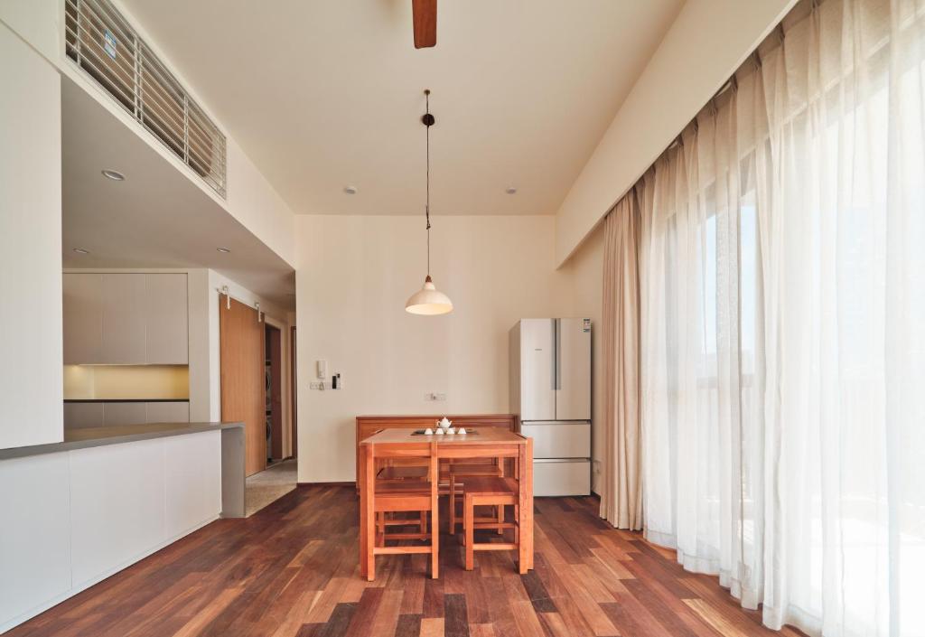 Kuchyň nebo kuchyňský kout v ubytování Wutong Hotel Apartment Bao'an Center