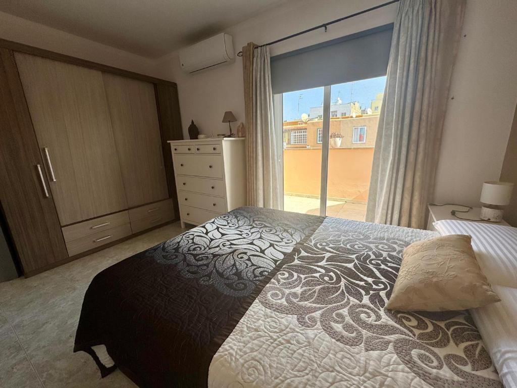 Postel nebo postele na pokoji v ubytování Lovely Terraced House in Costa del Silencio