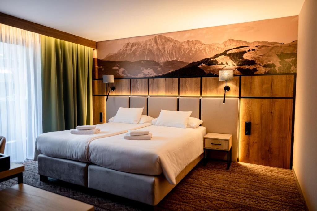 Katil atau katil-katil dalam bilik di Hotel Post Fusch