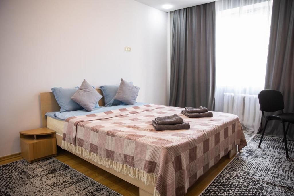 Llit o llits en una habitació de Comod apartment center