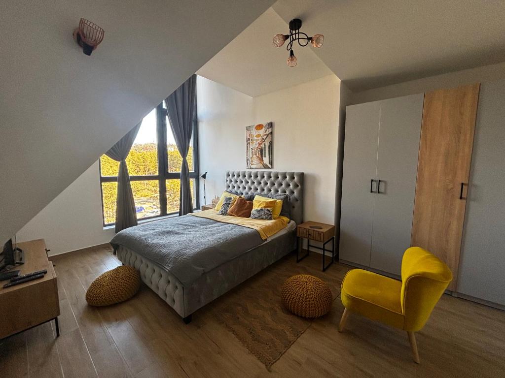 Llit o llits en una habitació de Apartman Yellow Moon