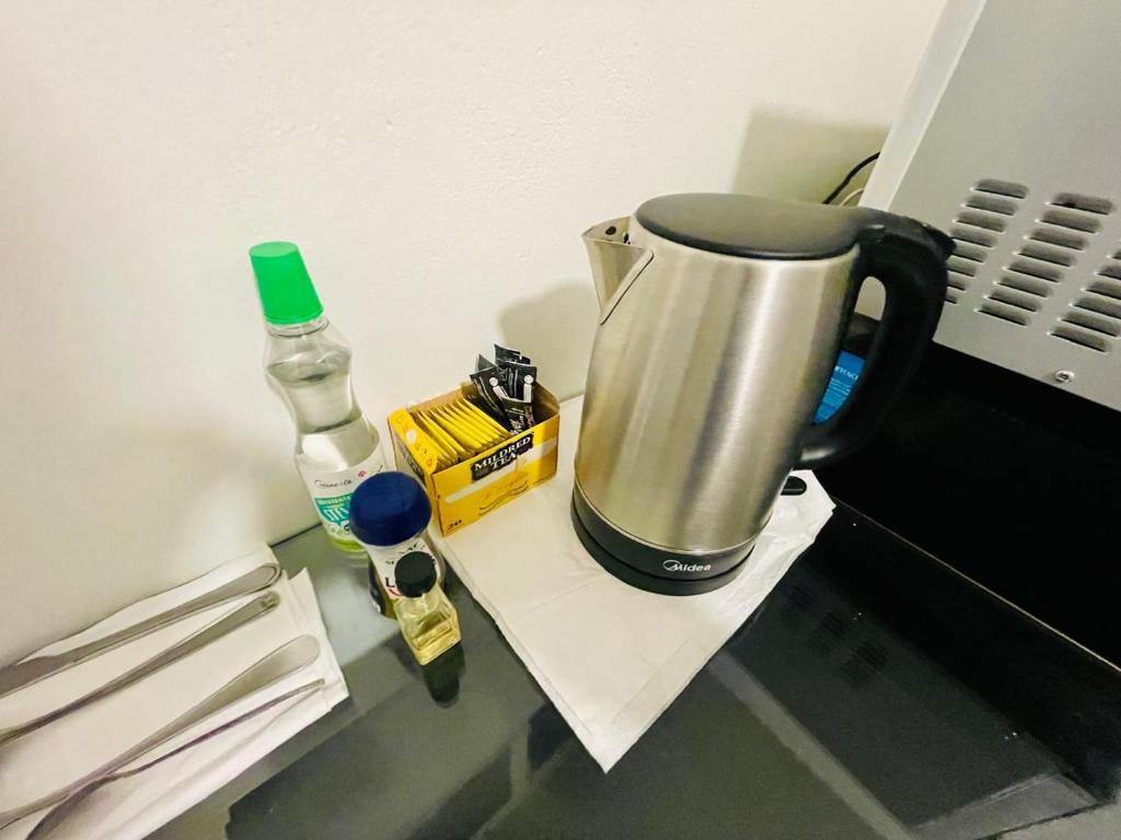 Una cocina o cocineta en Alojamiento Latadia Las Condes