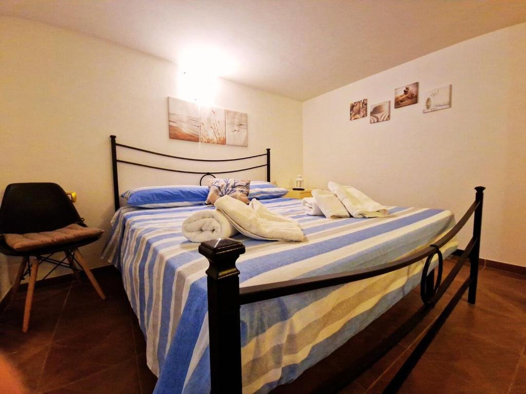 Postel nebo postele na pokoji v ubytování Le Quattro Stagioni