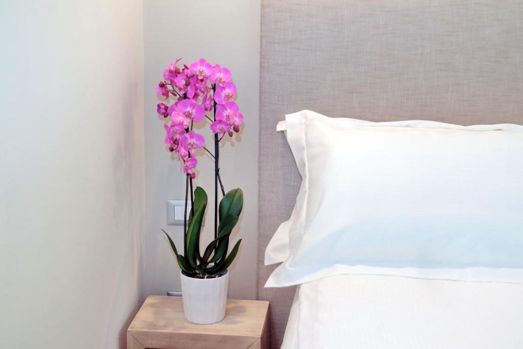 A bed or beds in a room at Cancelleriadieci