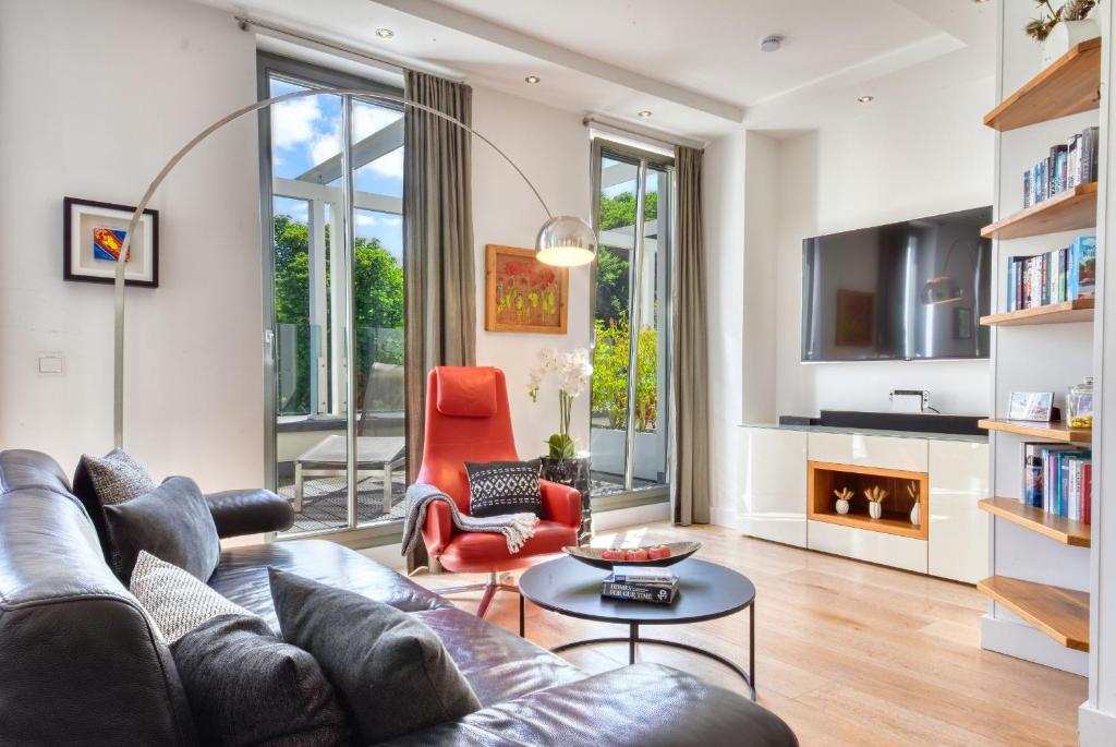 Et tv og/eller underholdning på Ferienwohnung Spa Penthouse in der Villa Amalie Binz