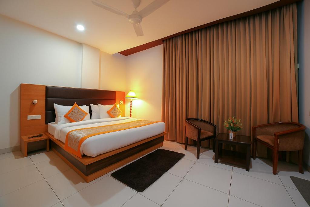Postel nebo postele na pokoji v ubytování Hotel Grand Regency by JMD Group Near Delhi IGI Airport