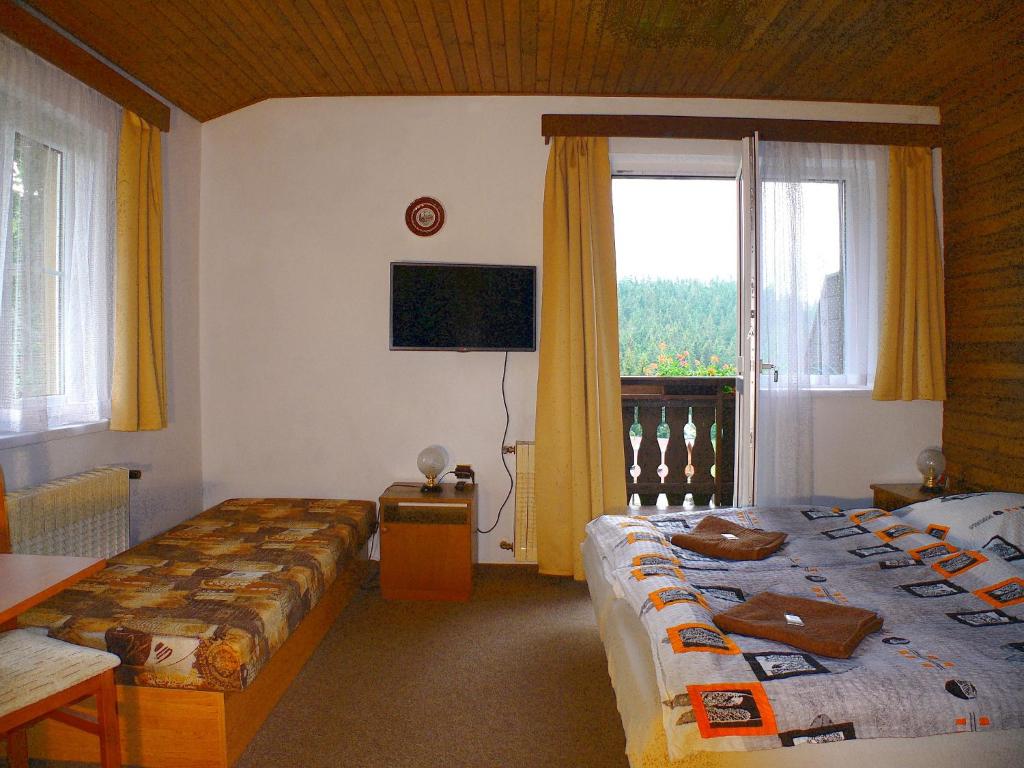Postel nebo postele na pokoji v ubytování Pension Faema