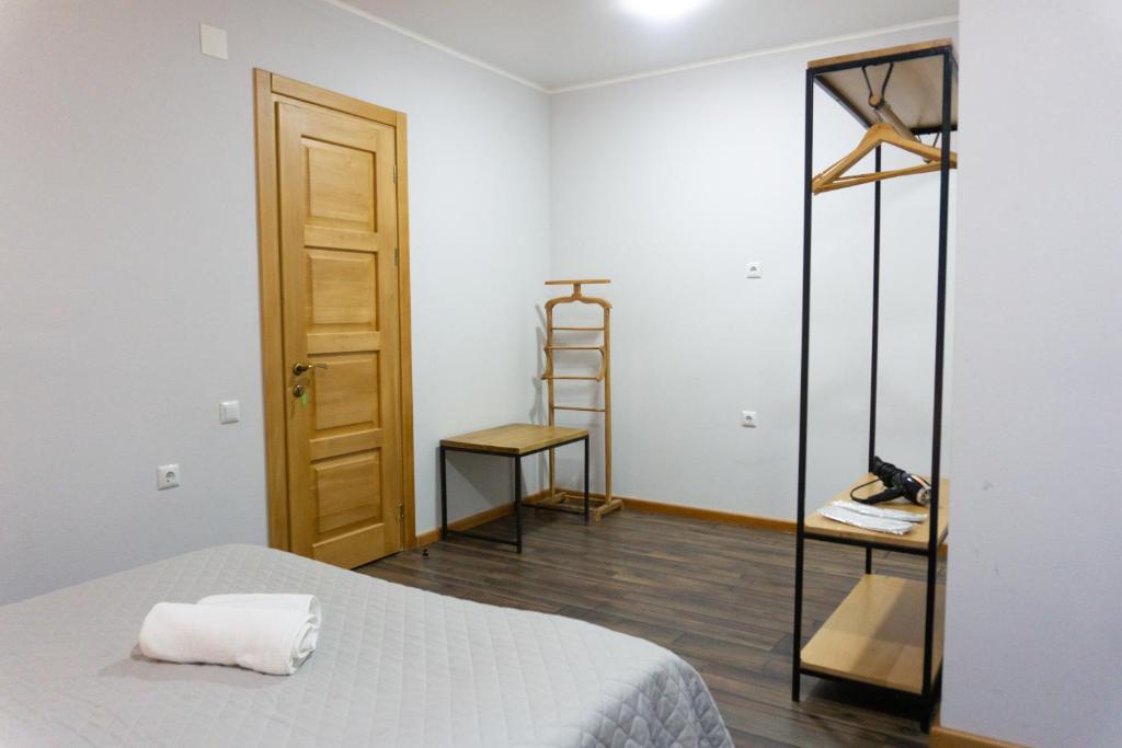 Postel nebo postele na pokoji v ubytování Lastili Inn Hotel