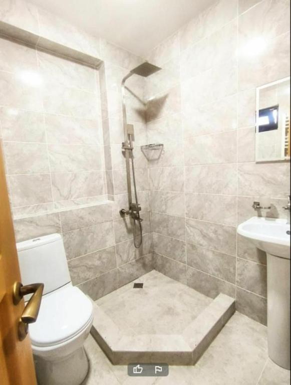 Koupelna v ubytování Lastili Inn Hotel