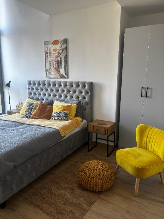Llit o llits en una habitació de Apartman Yellow Moon