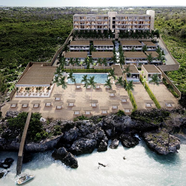 an aerial view of the resort and the water at Shah Palace Zanzibar - All Suites in Matemwe