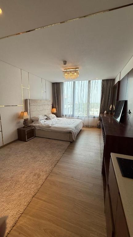 Postel nebo postele na pokoji v ubytování شقه ملينيوم ملك