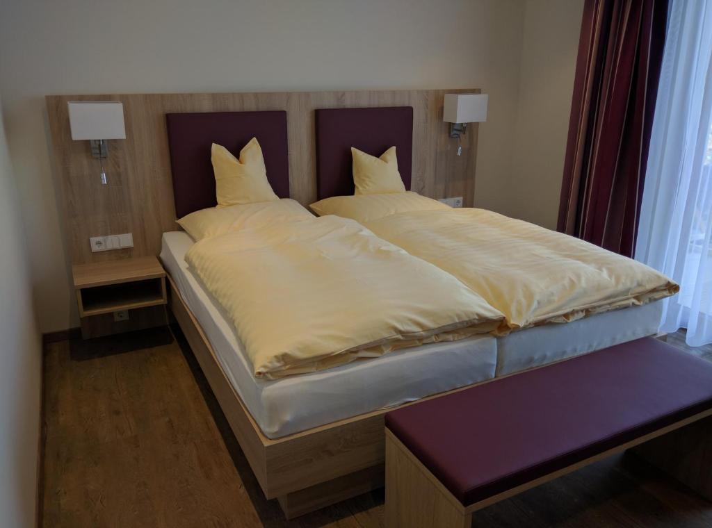 Postel nebo postele na pokoji v ubytování Hotel Zur-Borke