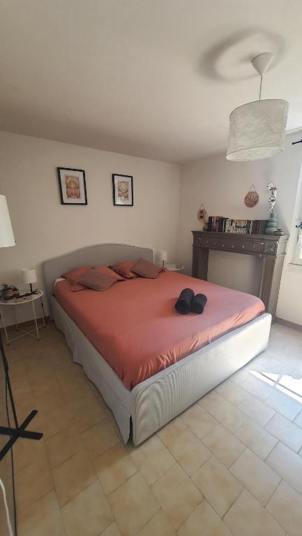 Postel nebo postele na pokoji v ubytování Cocon de Provence