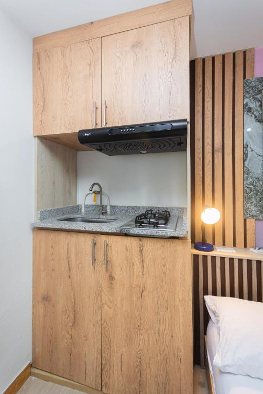 Kuchyň nebo kuchyňský kout v ubytování Hotel Lares 70 Laureles