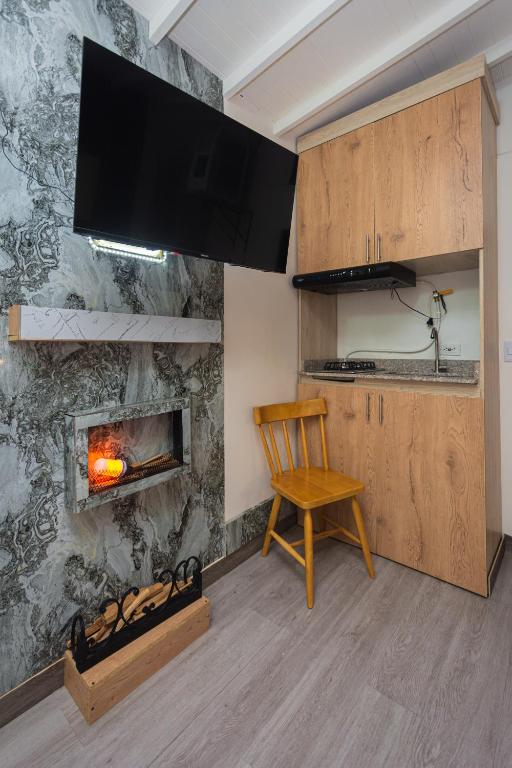 Kuchyň nebo kuchyňský kout v ubytování Hotel Lares 70 Laureles
