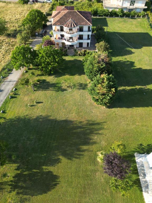 an aerial view of a large yard with a house at Antonios Apartments in Ulcinj