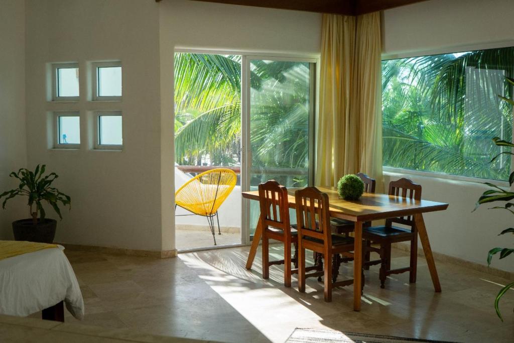 Posezení v ubytování Departamentos y cabañas a pie de playa -Baraka Beach Club