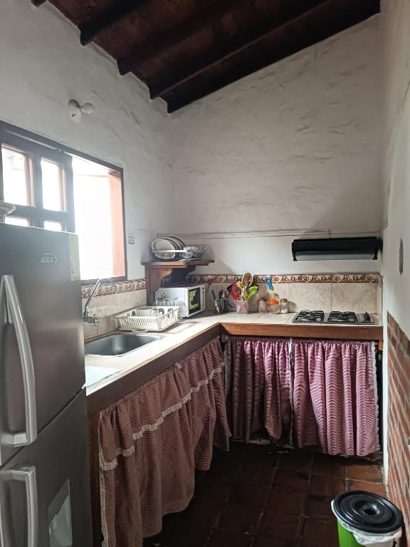 Kuchyň nebo kuchyňský kout v ubytování MONCOGUA Casa de Hospedaje