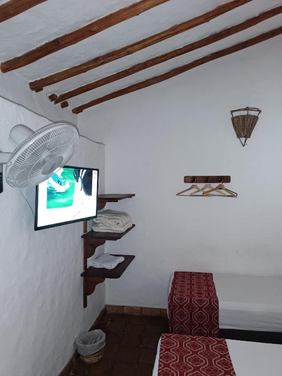 TV a/nebo společenská místnost v ubytování MONCOGUA Casa de Hospedaje