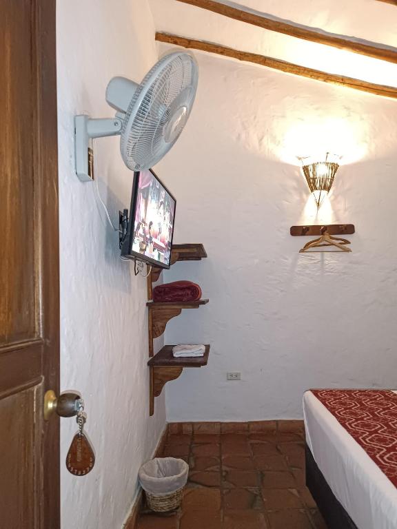 Postel nebo postele na pokoji v ubytování MONCOGUA Casa de Hospedaje