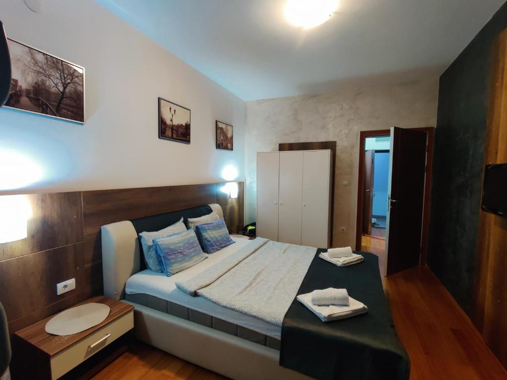 Postel nebo postele na pokoji v ubytování Petra Apartment, free parking
