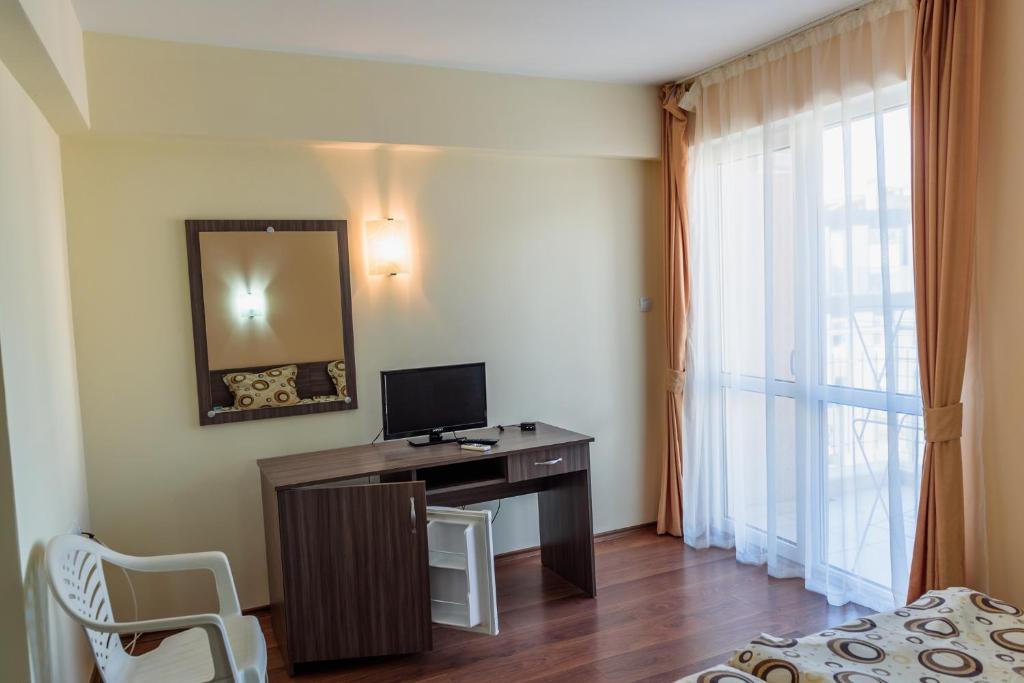 TV a/nebo společenská místnost v ubytování Hotel Ray