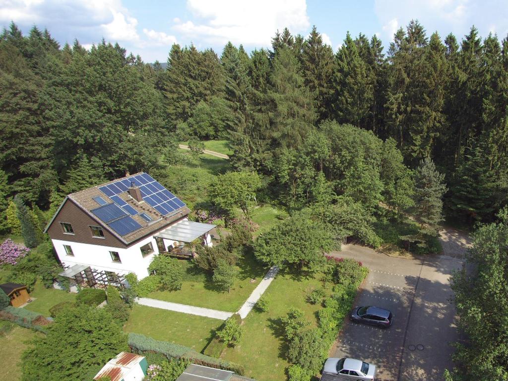 an aerial view of a house with a solar roof at Haus Fernblick in Bad Grund