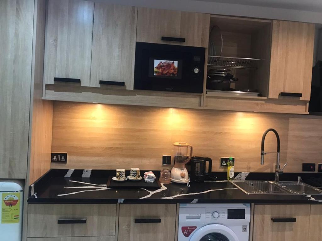 Una cocina o cocineta en SK Plaza
