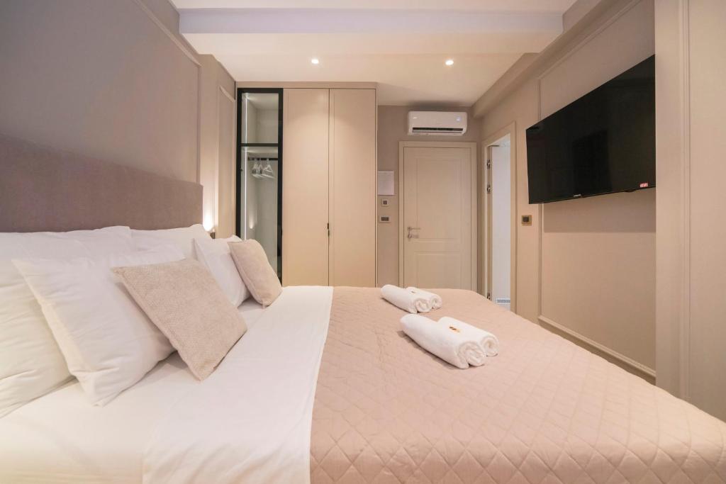 Katil atau katil-katil dalam bilik di Good Grace Apartments