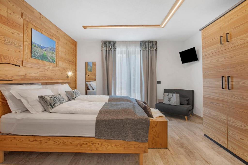 Postel nebo postele na pokoji v ubytování La Douce Pomme