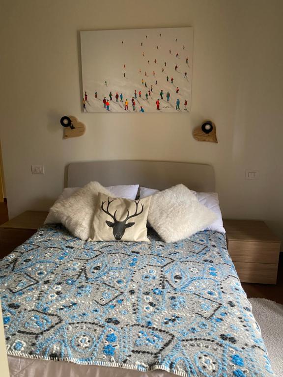 En eller flere senge i et værelse på Maison Poluc - Carpe Diem