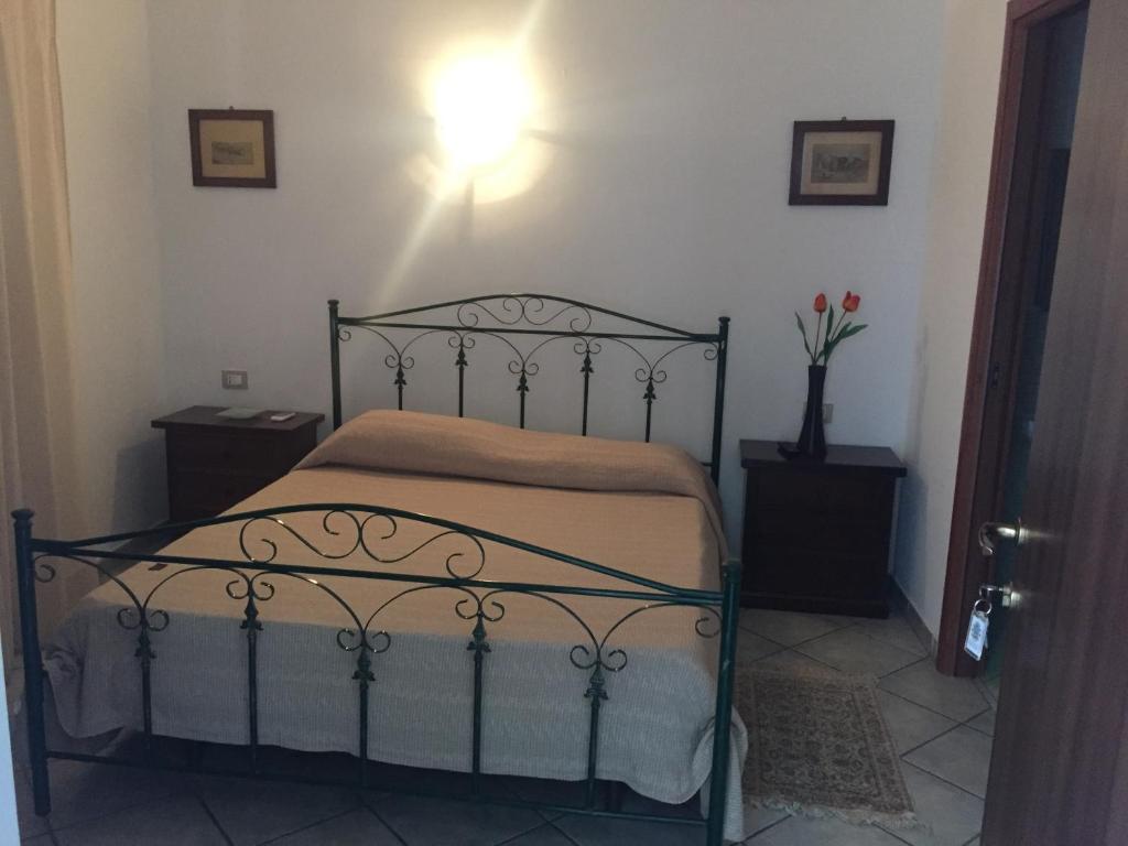 Postel nebo postele na pokoji v ubytování Sciacca Bed and Breakfast Natoli