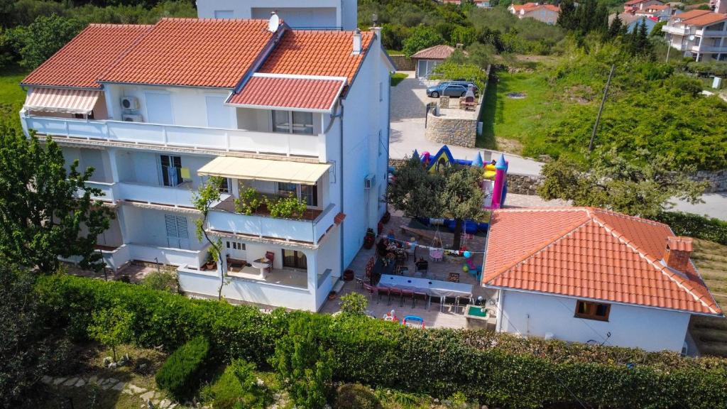 Apartments with parking space Palit, Rab - 4971