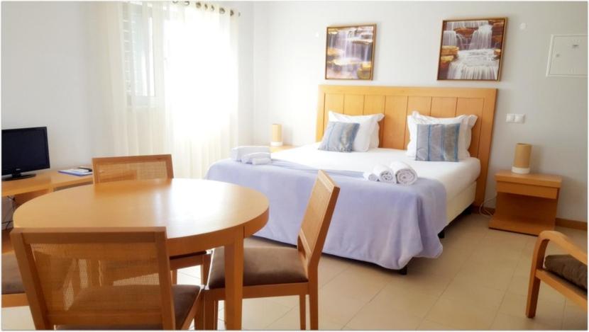 Cama o camas de una habitación en Vicentina Hotel