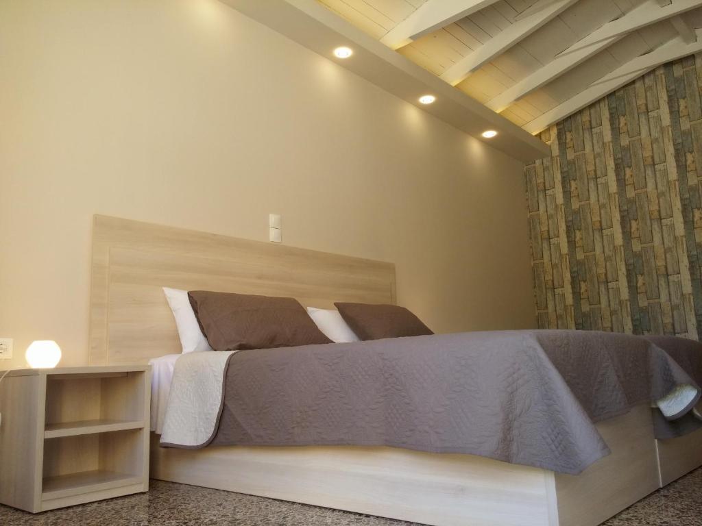 Ein Bett oder Betten in einem Zimmer der Unterkunft Anetis Hotel