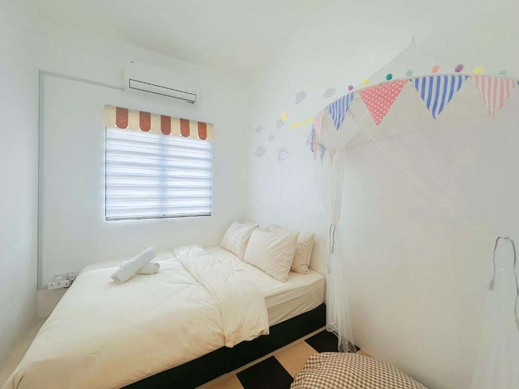 Postel nebo postele na pokoji v ubytování BM Alma AutoCity Aeonjusco