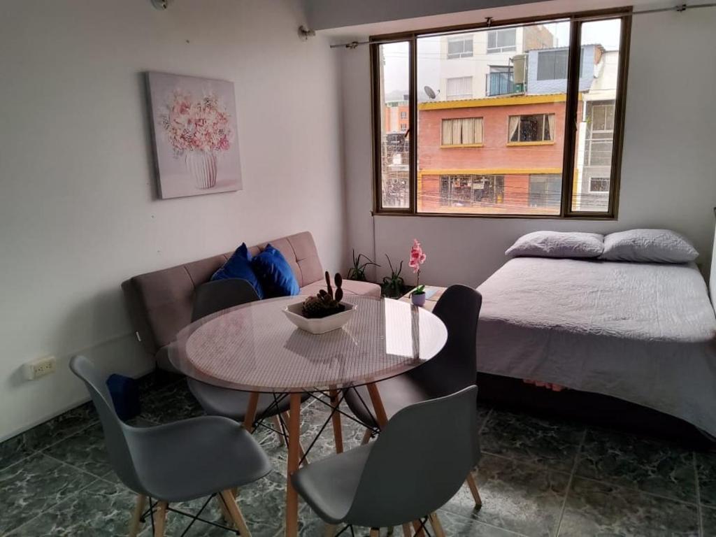 Ένα ή περισσότερα κρεβάτια σε δωμάτιο στο Ciudad del Sol Apartment