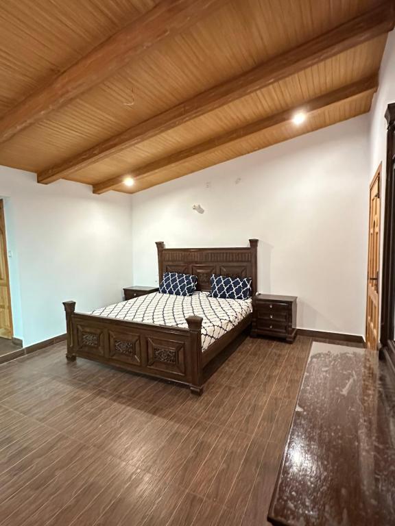 Postel nebo postele na pokoji v ubytování Sharfus cottage