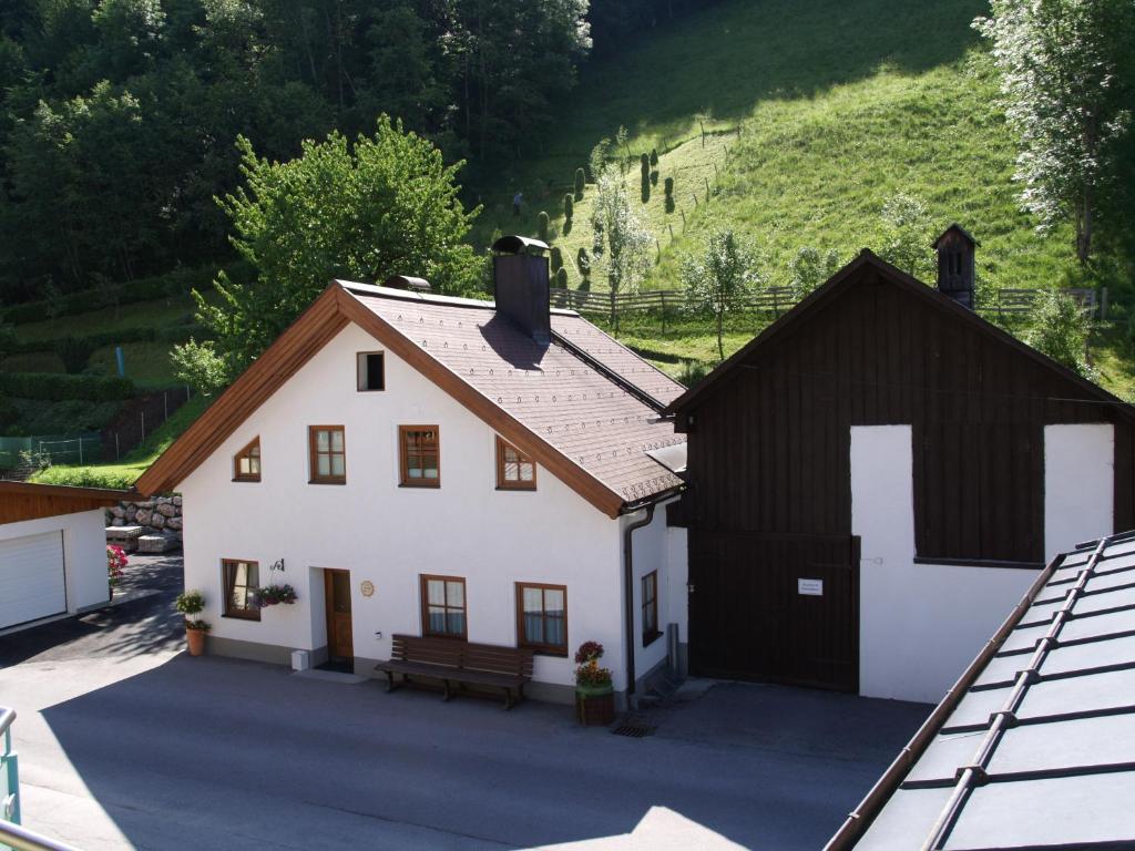 an aerial view of a white and black house at Simonegg in Schladming