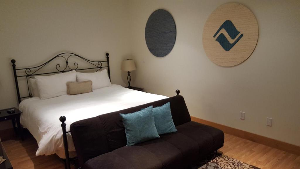 Postel nebo postele na pokoji v ubytování Hotel Minturn