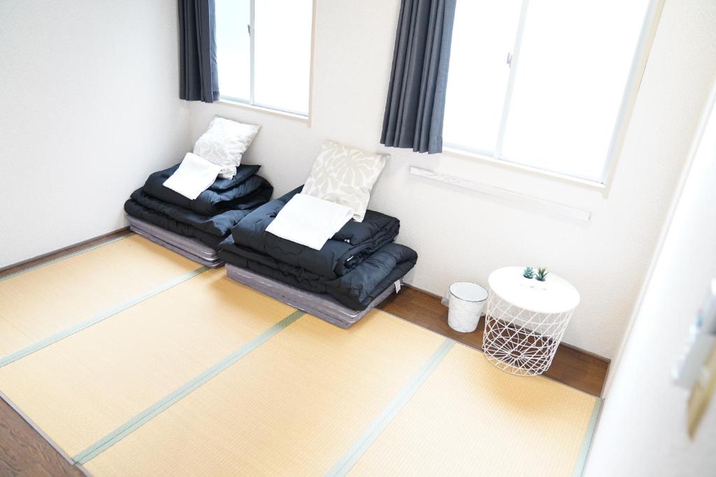 Χώρος καθιστικού στο 心斎橋難波関空直通Nambaminami Shin-Imamiya Ambers Hostel