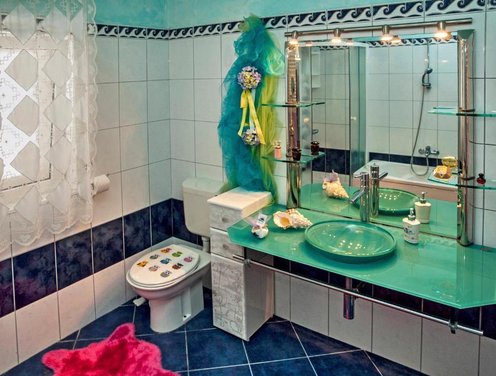 Koupelna v ubytování Villa Ria