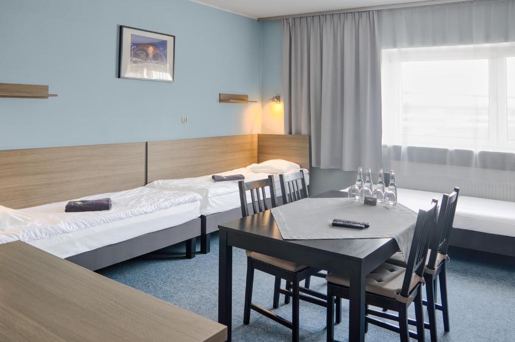 Posteľ alebo postele v izbe v ubytovaní Hostel Azymut