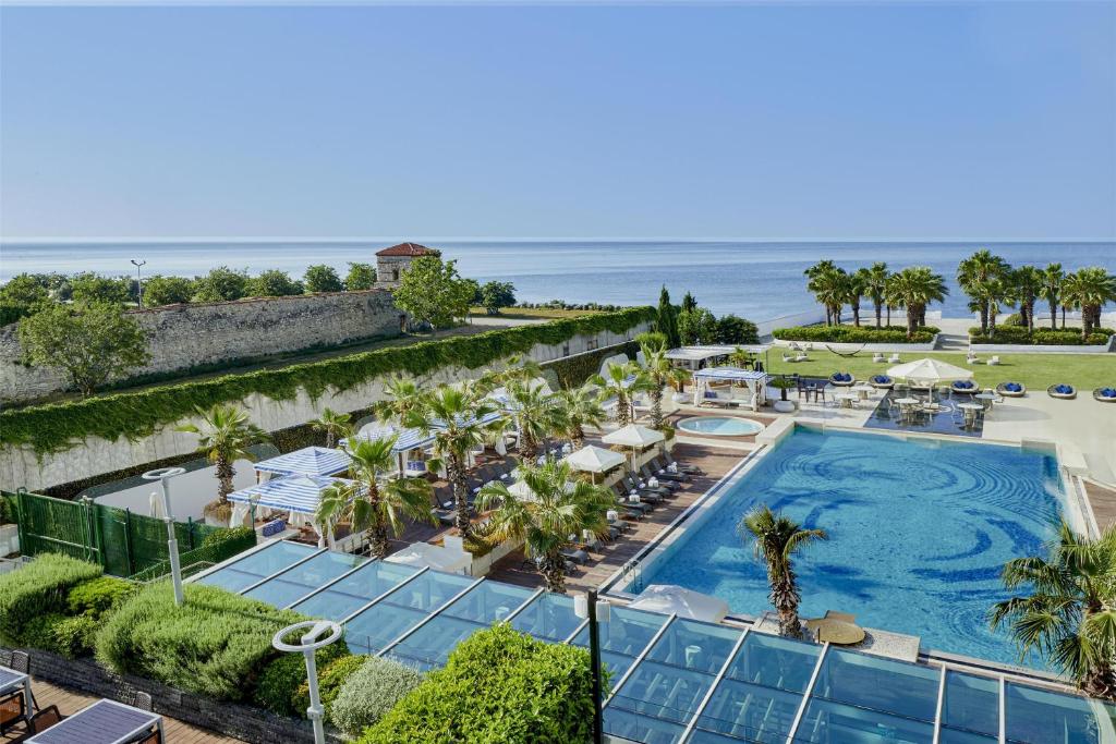 an aerial view of a resort with a pool and the ocean at Hyatt Regency Istanbul Atakoy in Istanbul