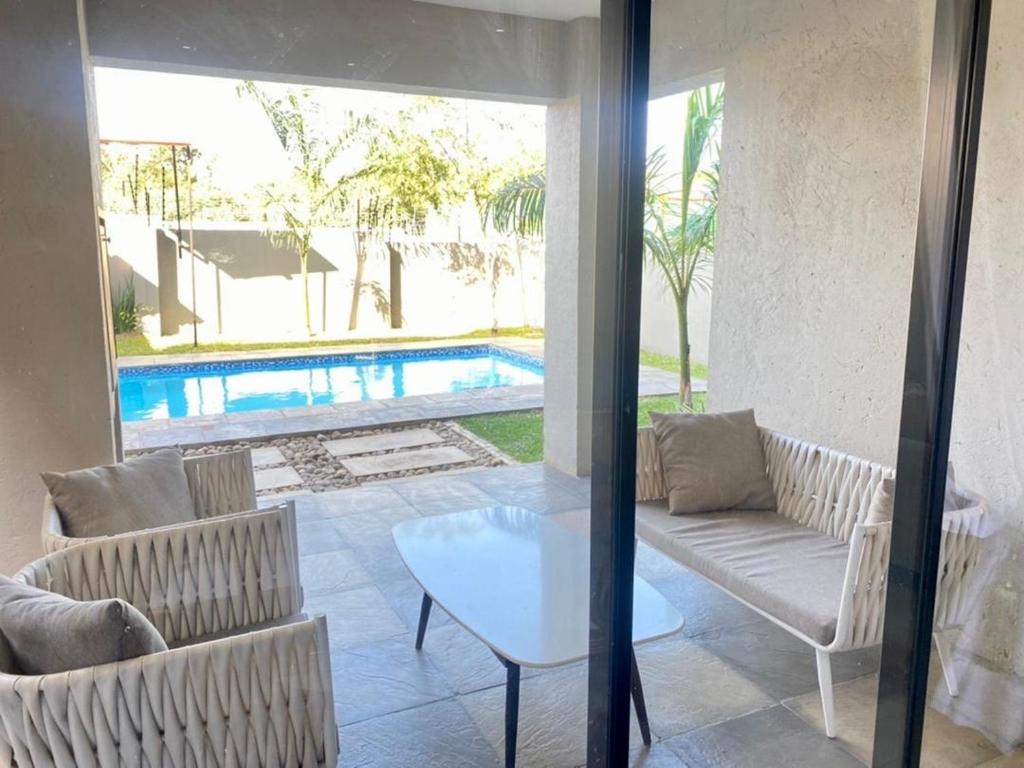 Πισίνα στο ή κοντά στο Roma park fully equipped villas