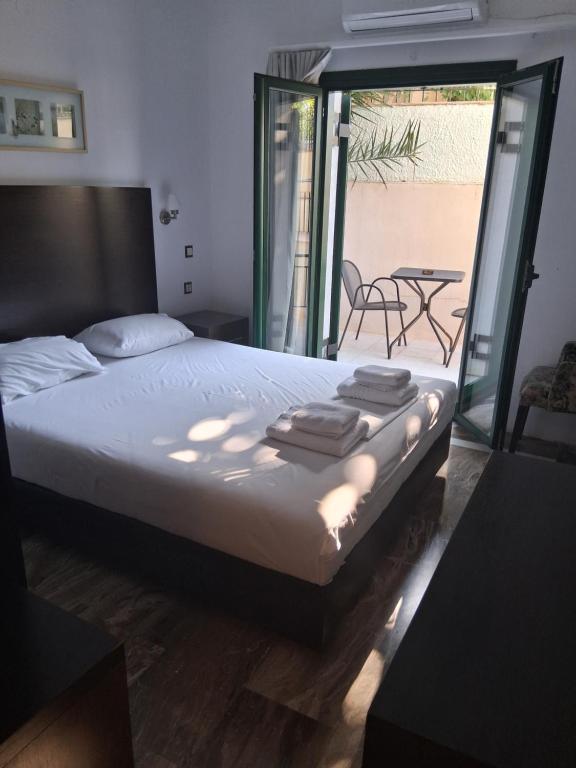 A bed or beds in a room at Villa Vasso